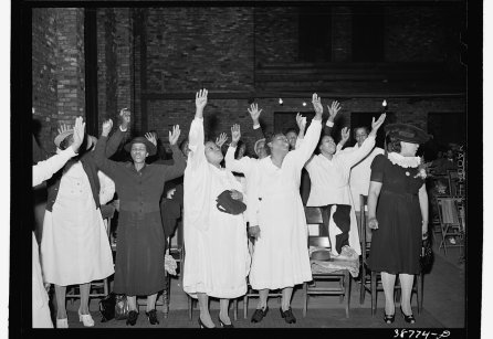 Members of the Pentecostal church praising the Lord. Chicago, Illinois