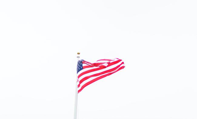American flag isolated against stark white background