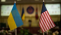 Ukrainian blue and yellow flag next to American flag